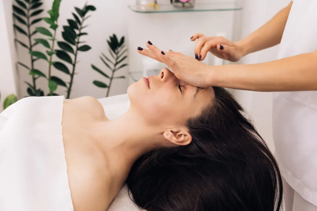 Close up of young girl receiving a facial massage